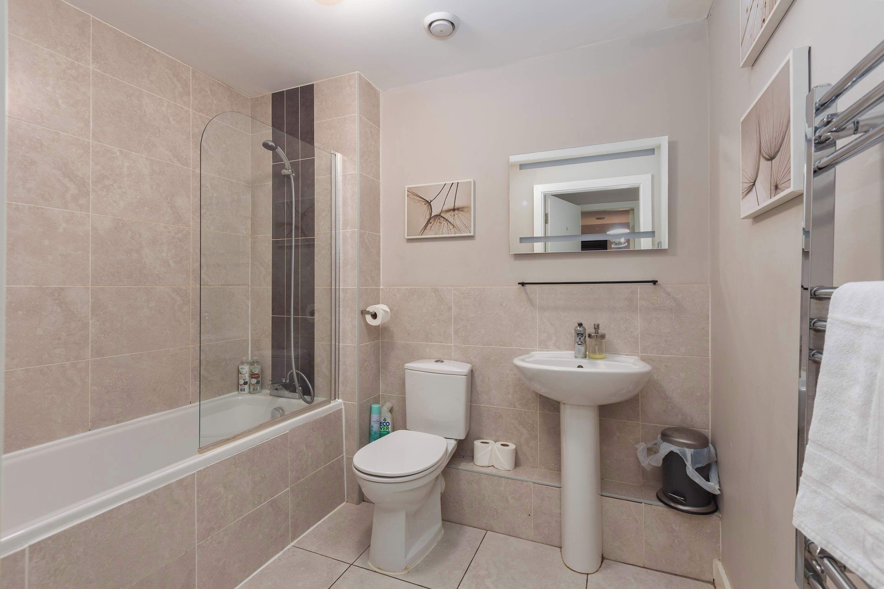 Bathtub, hair dryer, towels