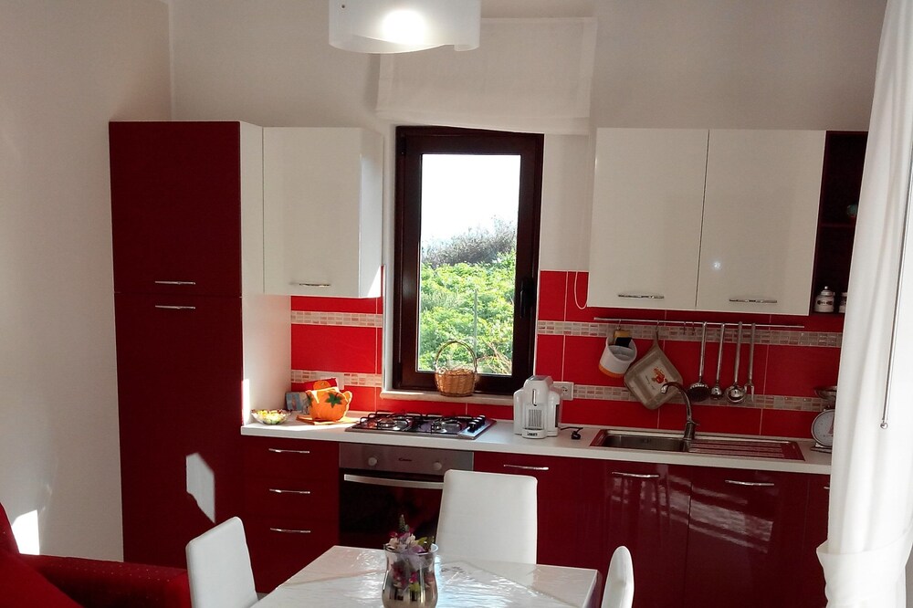 Apartment with garden and "Luna Rossa" terrace