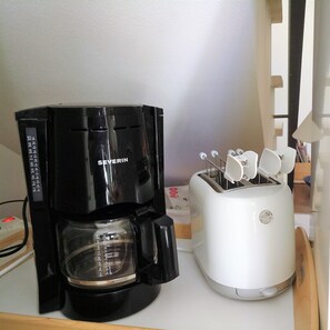 Kaffee und/oder Kaffeemaschine