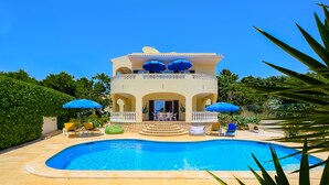 A two-story building with a swimming pool, outdoor seating, and a satellite dish. - ❀Family Paradise. Peaceful, golf, countryside & beach, pool, close to everything (Lagos)