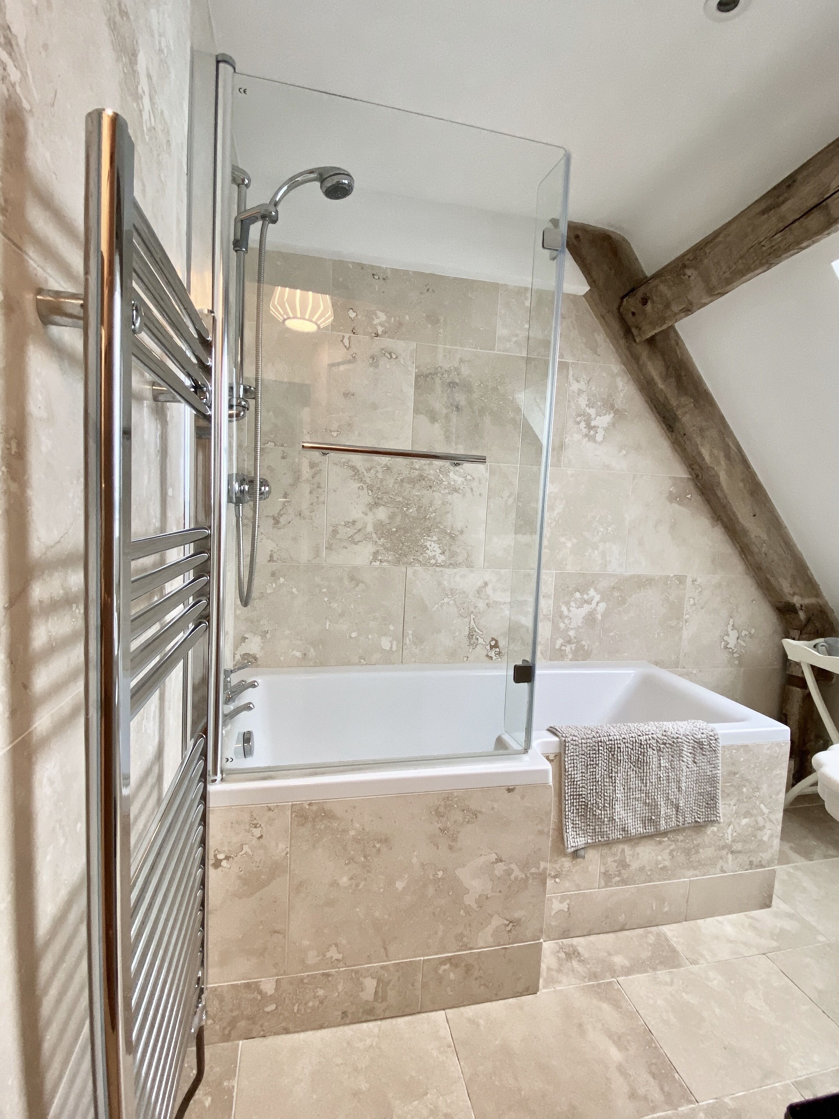 Combined shower/tub, hair dryer, towels, soap