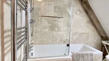 Combined shower/tub, hair dryer, towels, soap
