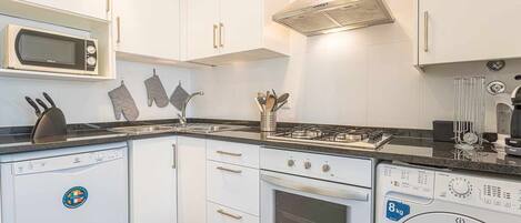 Oven, dishwasher, dining tables