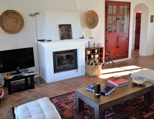 Gardian's house surrounded by vineyards and oak and olive  trees