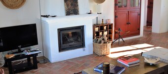 Gardian's house surrounded by vineyards and oak and olive  trees