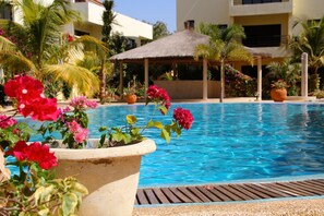 Outdoor pool - "Le Voyageur" Beautiful apartment in the Natangué Sud residence in the heart of Saly (M'bour)