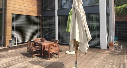 Minimalistic family house on the edge of the woods but 15 min from the city