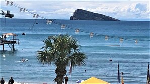 On the beach, sun loungers