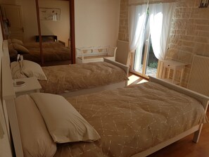 3 bedrooms, desk, iron/ironing board, travel cot