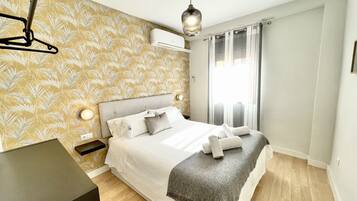 2 quartos, ferros/tábuas de passar roupa, Wi-Fi, roupa de cama