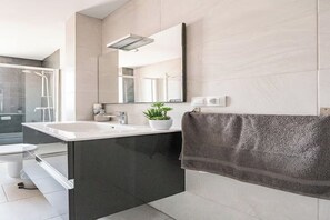 Hair dryer, towels, soap, shampoo