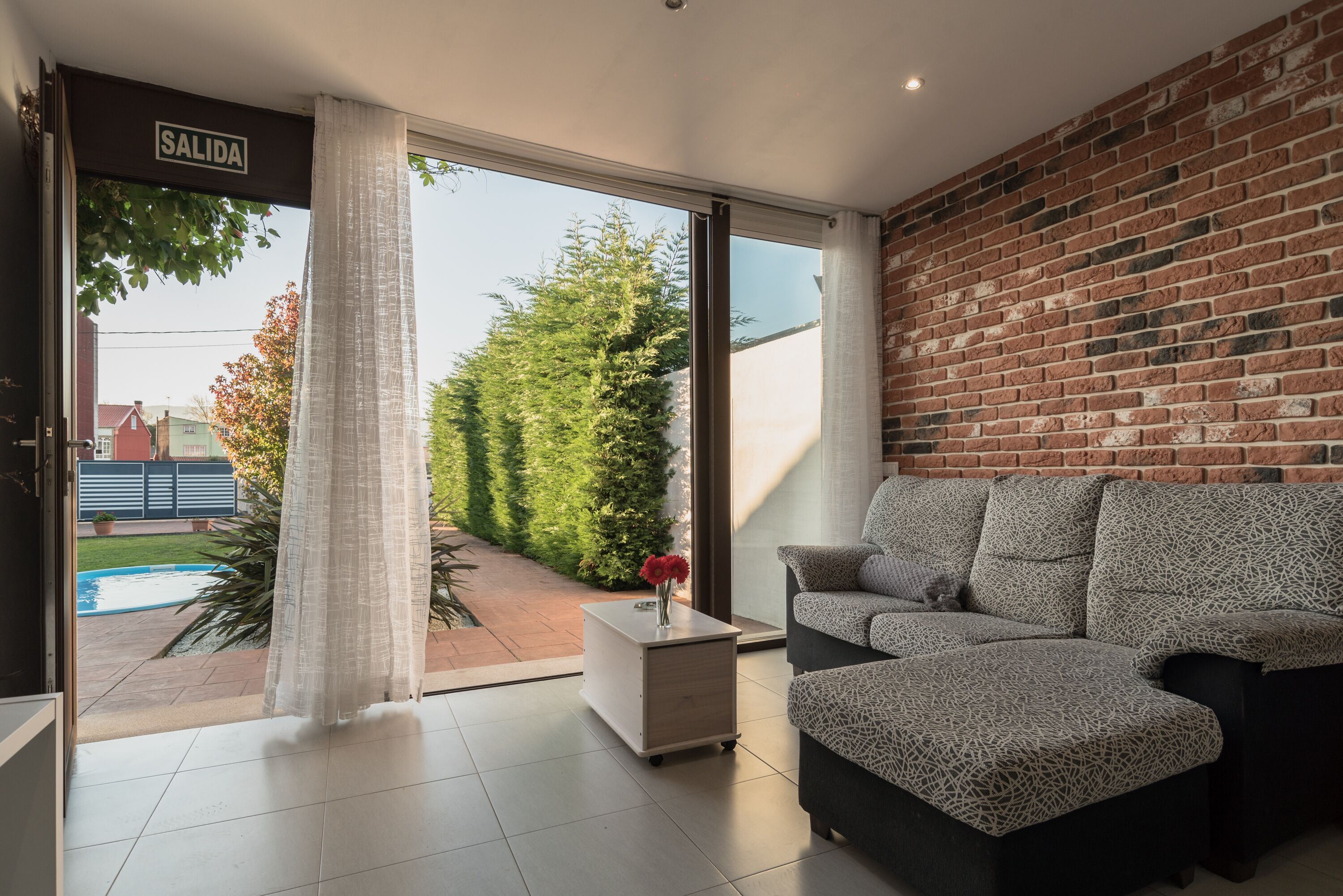 TV, fireplace, books