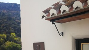 A building with a sign reading "EL CIELO" and a tiled roof. - The sky at Salares in Andalusia  (Salares)