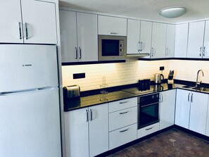 Fridge, microwave, oven, stovetop