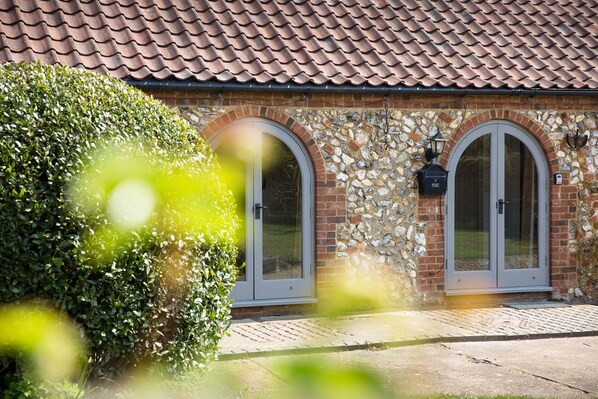 Exterior detail - The Old Stables is a self contained detached 2 bedroom cottage. (Docking)