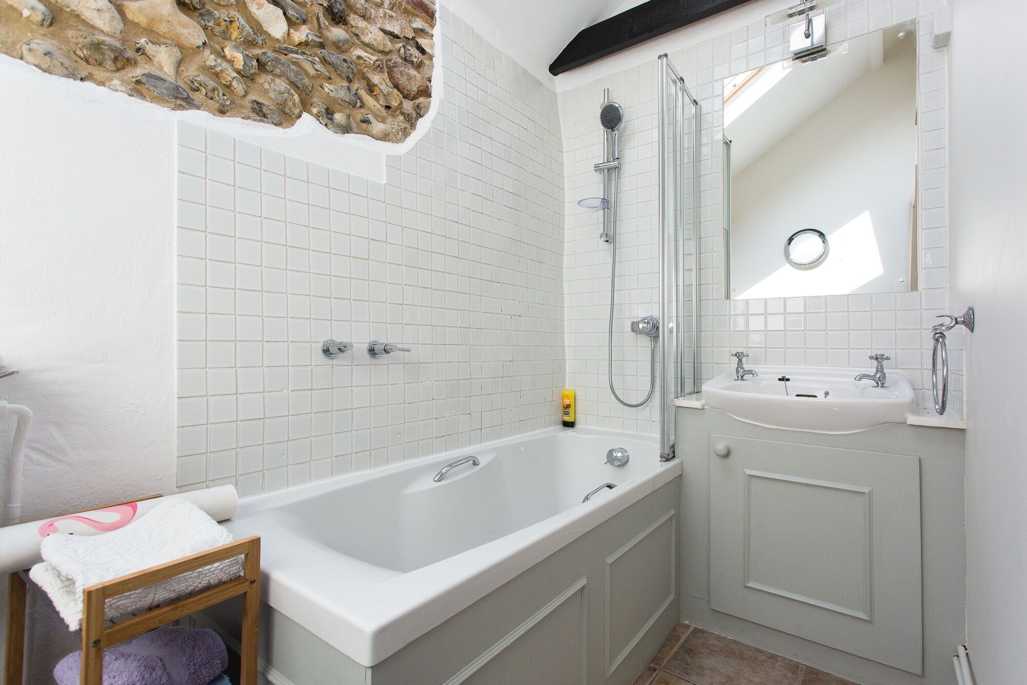 Combined shower/bathtub, hair dryer, towels, soap