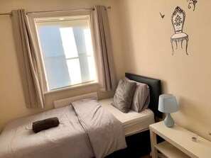3 slaapkamers, een strijkplank/strijkijzer, gratis wifi