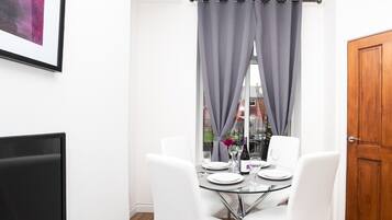 Traditional Apartment, 1 Bedroom | Living area | 42-inch flat-screen TV with digital channels, TV