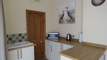 Fridge, microwave, electric kettle, toaster