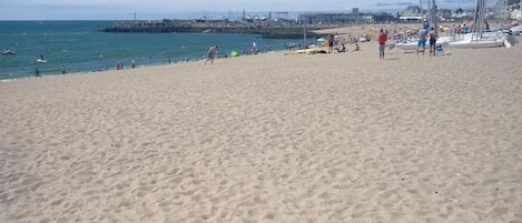 On the beach, sun loungers