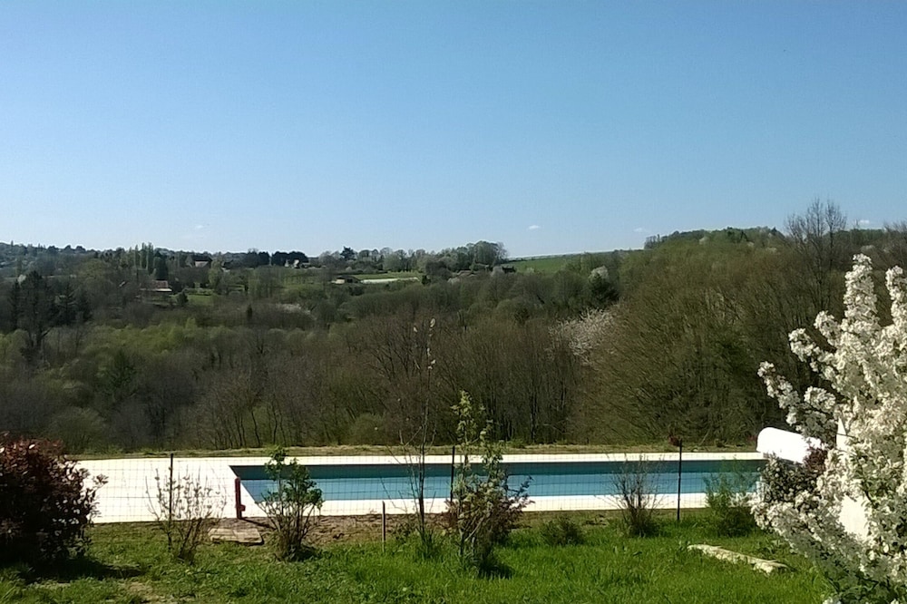 An ecological limousine in the countryside with swimming pool
