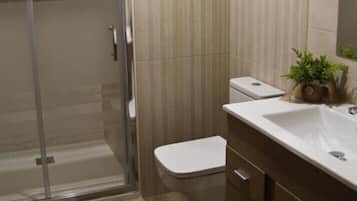Hair dryer, towels, soap, shampoo