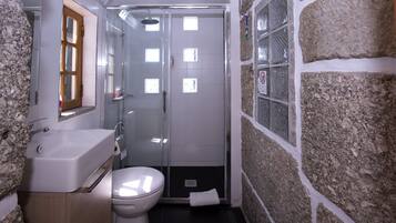 Combined shower/tub, hair dryer, towels, soap