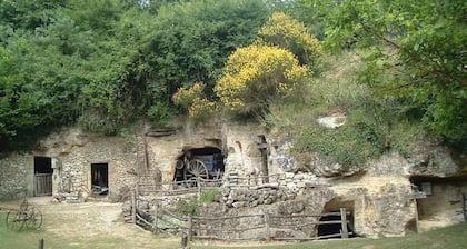 Jolie maison dans un écrin de verdure.