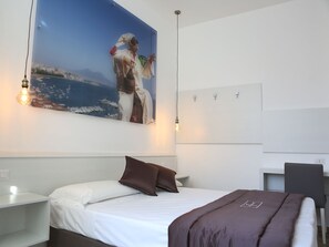 1 غرفة نوم ومكواة/لوح كي وواي فاي وملاءات أسرّة