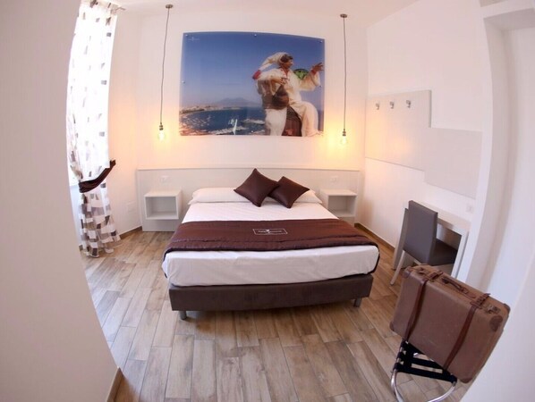 1 غرفة نوم ومكواة/لوح كي وواي فاي وملاءات أسرّة