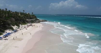 Beautiful secluded Villa with views across the golf course to the Caribbean Sea.