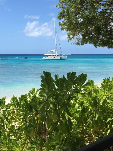 Beautiful secluded Villa with views across the golf course to the Caribbean Sea.