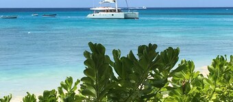 Beautiful secluded Villa with views across the golf course to the Caribbean Sea.