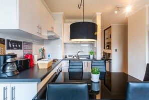 Fridge, microwave, oven, coffee/tea maker