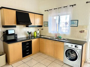 Fridge, microwave, oven, stovetop - Beachfront Apartment with Pool & Tennis - Flic En Flac  (Flic en Flac)