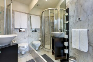 Shower, free toiletries, hair dryer, towels
