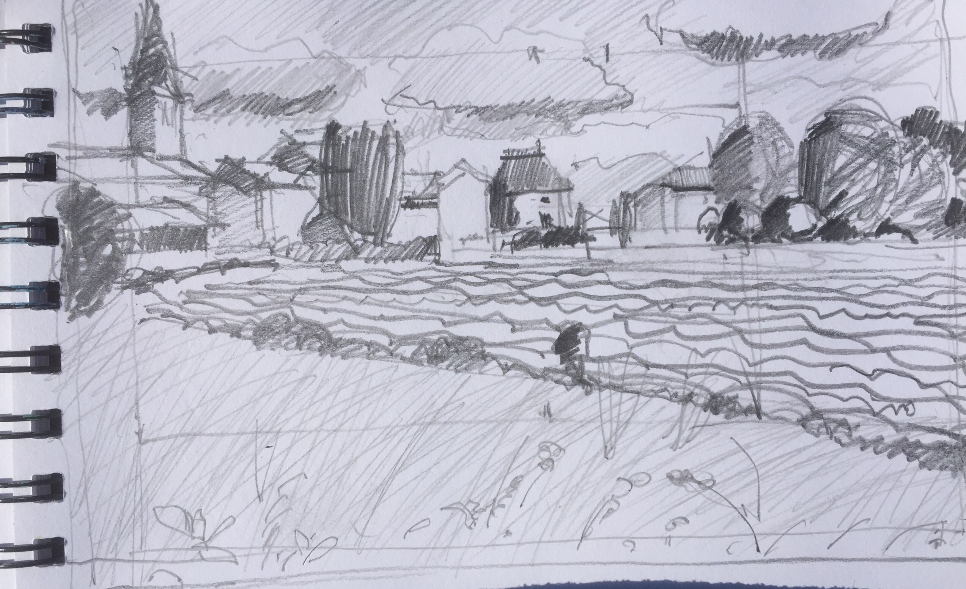Un dibujo de un paisaje con edificios, árboles y una masa de agua.