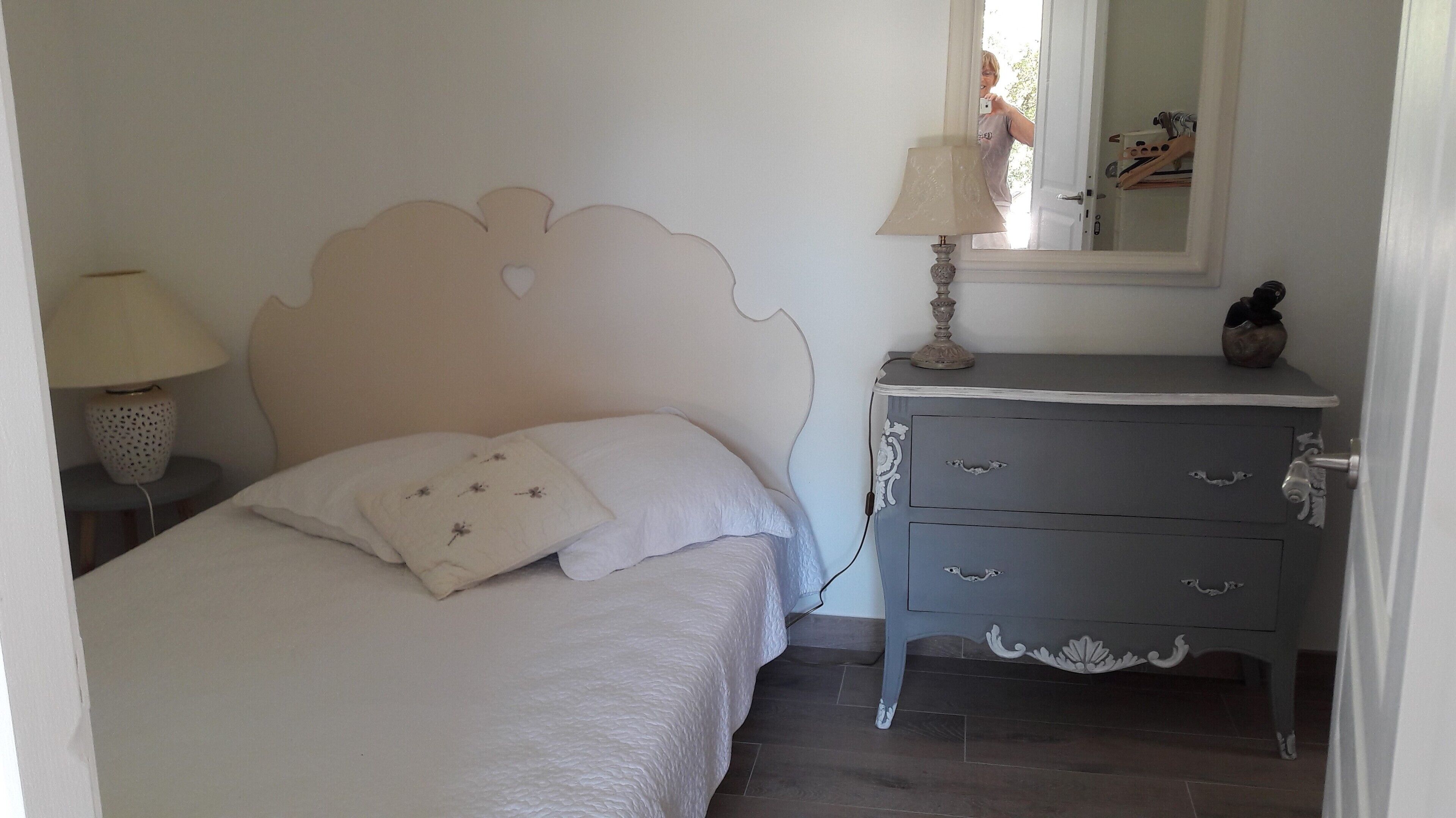 Stone shed in wooded property with swimming pool