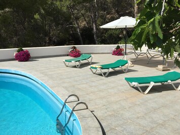 The 220 sq.m. private pool terrace (not overlooked). Parasols hammocks & flowers