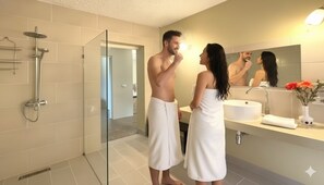 Ducha, secador de pelo, toallas y jabón