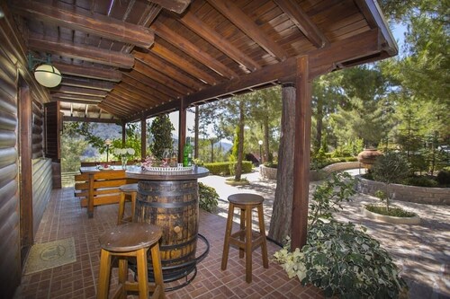 Three charming log cabins in a gated property at the beautiful Troodos mountain r