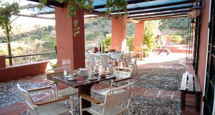 Casa Millán is a small farmhouse located in the valley of the Las Pasadas River