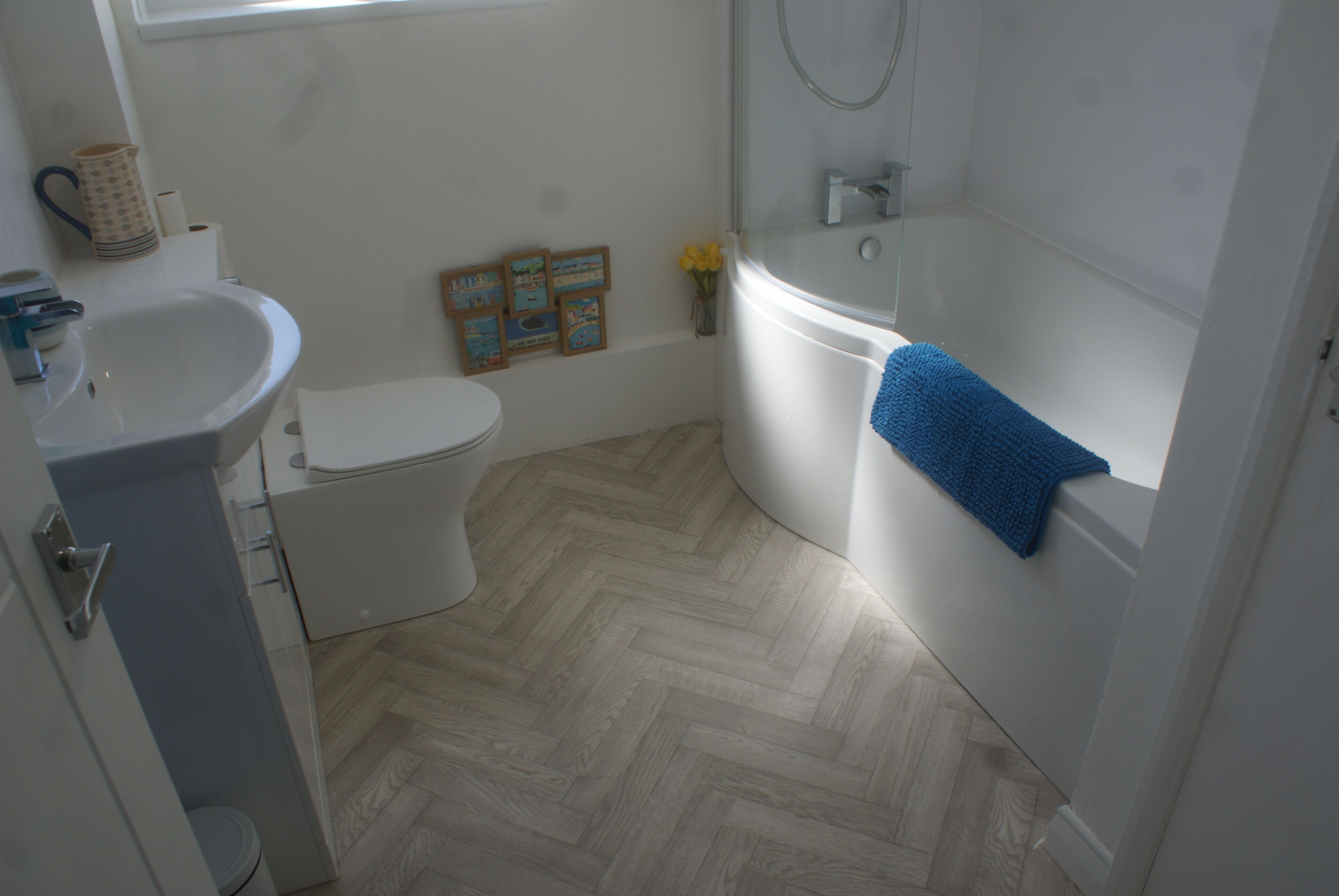 Combined shower/tub, hair dryer, towels, toilet paper