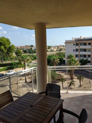 Enjoy a peaceful retreat with a balcony overlooking the surrounding neighborhood.