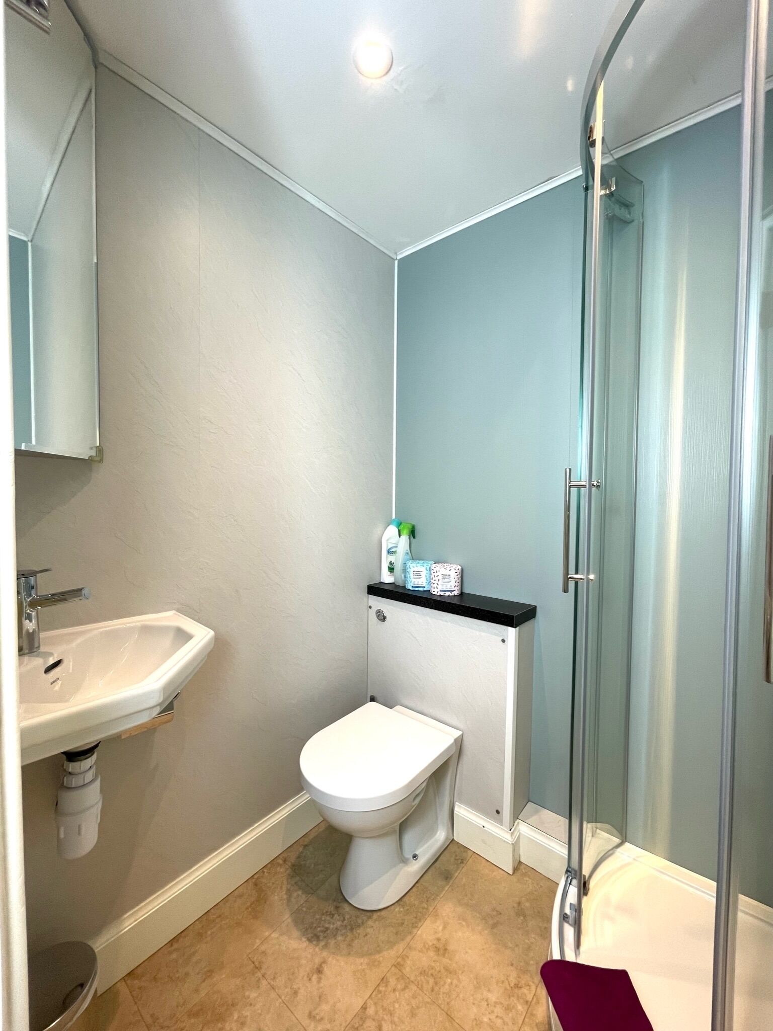 Combined shower/tub, hair dryer, towels, soap