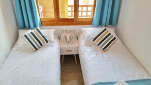 2 habitaciones, tabla de planchar con plancha y wifi gratis 
