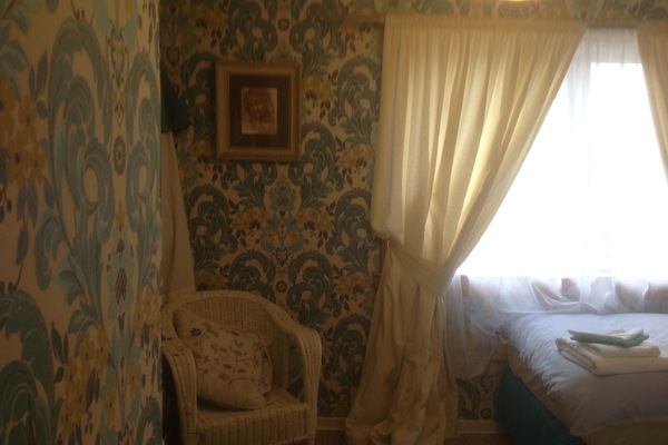 Twin bedroom with views over to Dalquarin castle.