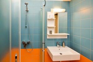 Combined shower/tub, hair dryer, towels, soap
