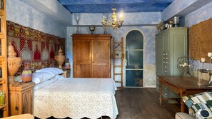 A room with a bed, a wooden wardrobe, a desk, and a chandelier. - RELAIS VILLA LINA LANDMARK ORGANIC FARM TUSCIA ROME 18th century (Ronciglione)