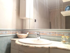 Combined shower/tub, jetted tub, bidet